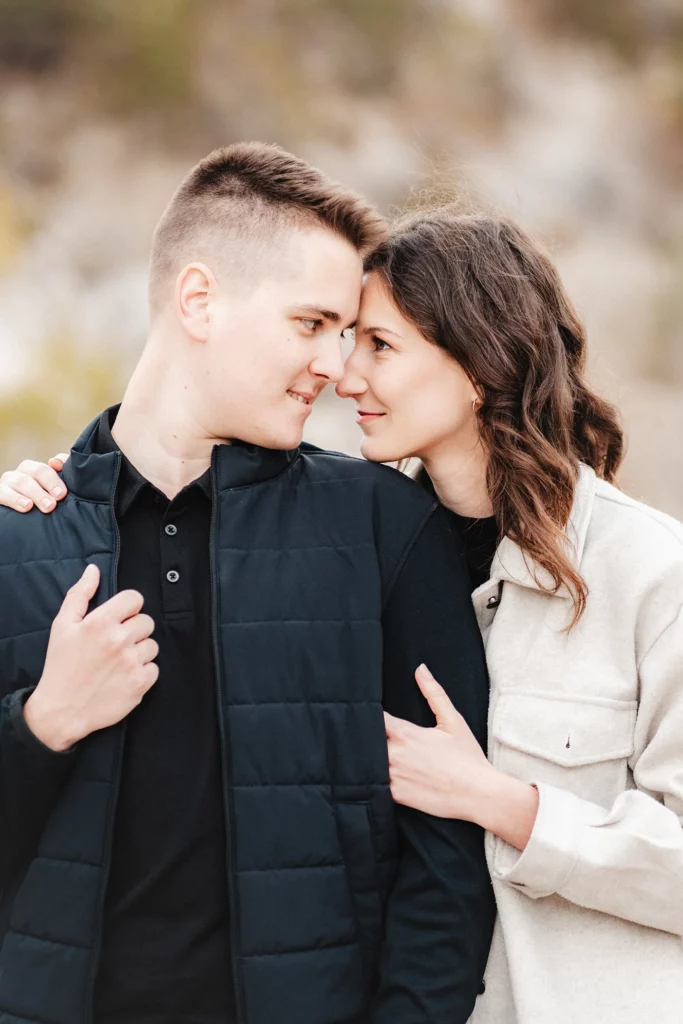 a man and woman looking at each other